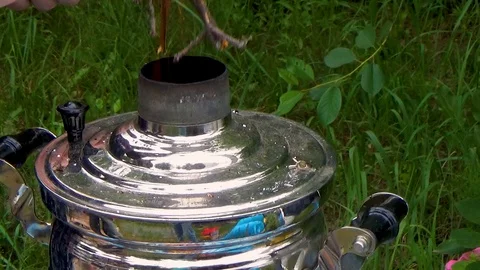 Branches are laid in the samovar Video stock 114761833