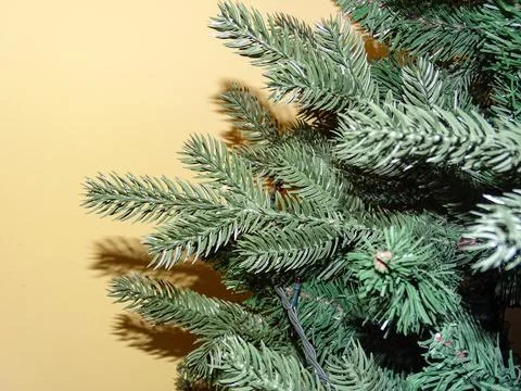 Branches of an artificial Christmas tree. Details Stock Photos