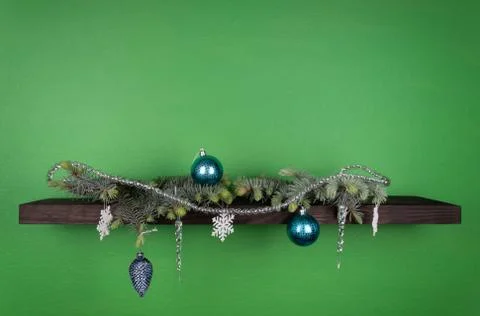 Branches of an evergreen tree smelling of needles decorated with winter holid Stock Photos