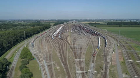 Branches of the railway at the marshalling yard, a lot of freight wagons Stock Footage 115796678