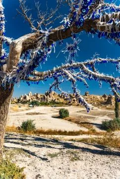 The branches of tree decorated with evil eye amulets, Goreme, Cappadocia, Turkey Stock Photos