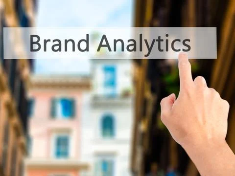 Brand Analytics - Hand pressing a button on blurred background concept on vis Stock Photos