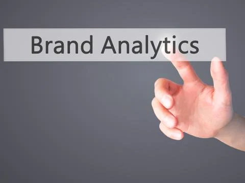 Brand Analytics - Hand pressing a button on blurred background concept on vis Stock Photos
