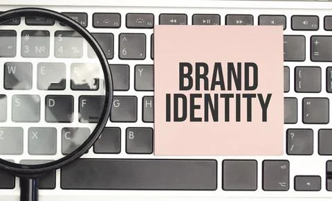 Brand identity text and notepad with pen, charts and calculator Fotos de archivo