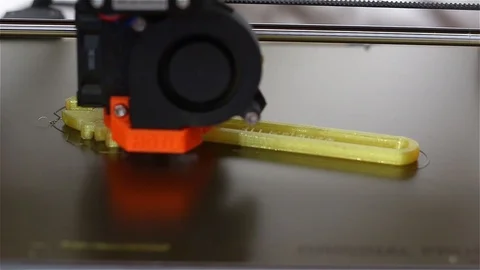 Brand new 3D printer prints a fully functional adjustable wrench/spanner. Video stock 97639034