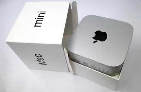 Brand new apple computer in package Stock Photos