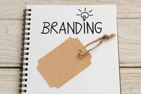 Branding idea concept with brand tag on notebook Foto stock