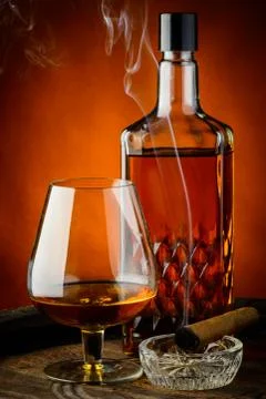 Brandy and cigar Stock Photos