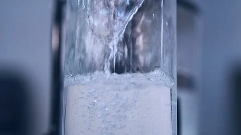 Brandy bottle being filled at distillery during bottling Stock-Footage 87121496