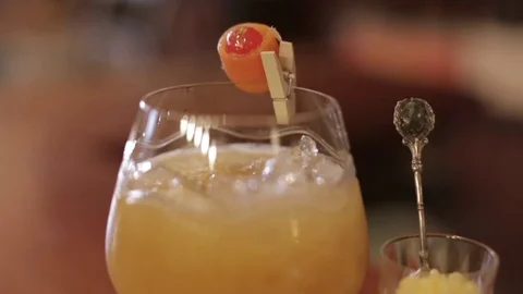 Brandy Cocktail Served with Pineapple Stock Footage 77032651