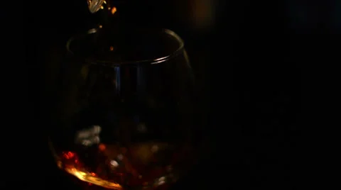 Brandy glass slow motion Stock Footage 24718226