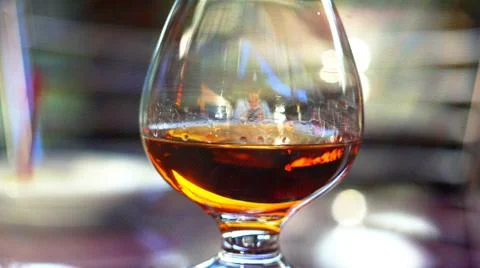 Brandy with lemon. Stock Photos