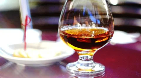 Brandy with lemon. Stock Photos