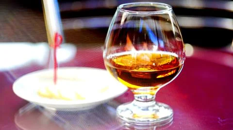 Brandy with lemon. Stock Photos