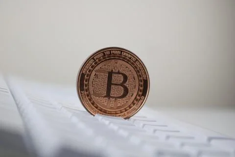 Brass bitcoin coin Stock Photos