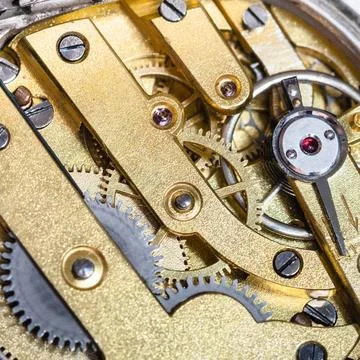 Brass clockwork of old mechanical watch watchmaker workshop - brass clockw... Stock Photos