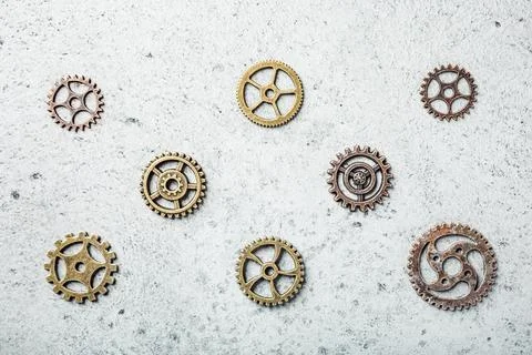 Brass cog wheels, steampunk background Stock Photos