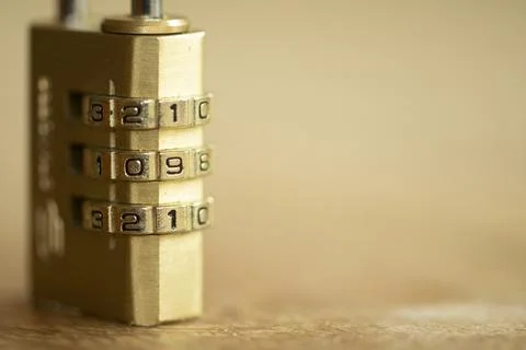 Brass combination padlock with numeric code for security and data protection Stock-Fotos