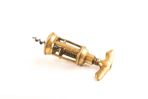 Brass corkscrew over a white background Stock Photos
