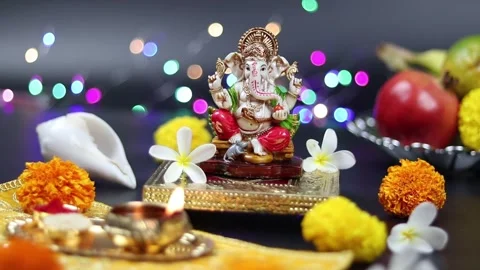 Brass Diya Or Deep Lit And Statue Of Hindu God Lord Ganesha Ganpati Bappa Mor Stock Footage 162339241