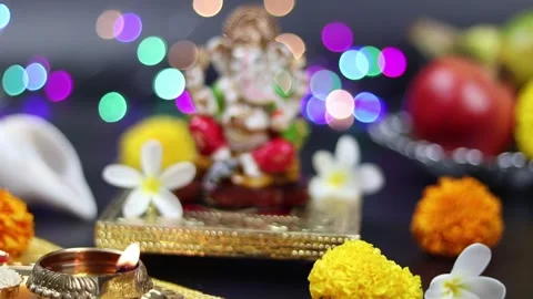 Brass Diya Or Deep Lit And Statue Of Hindu God Lord Ganesha Ganpati Bappa Mor Stock Footage 162339246