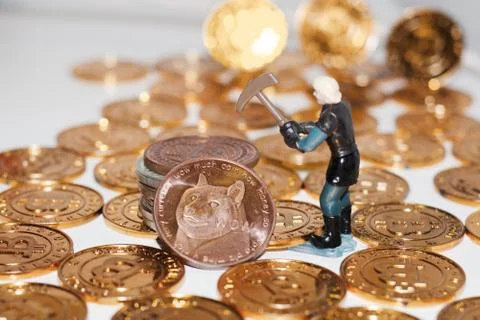 Brass dogecoin mining Stock Photos