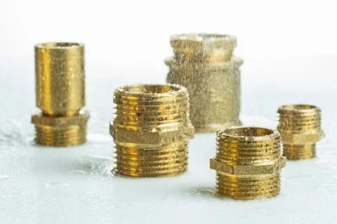 Brass Fitting Items for Water Installation on Workshop Table Stock Photos