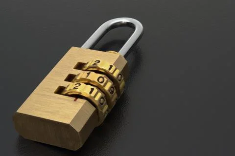 Brass lock with the code set on the dark surface. Stock Photos