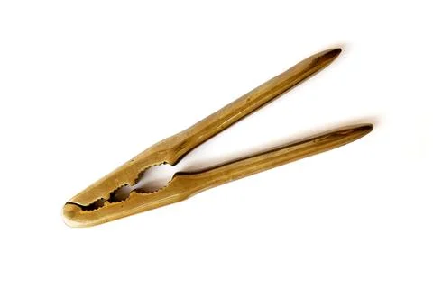 Brass nutcracker on white background Stockfoto's