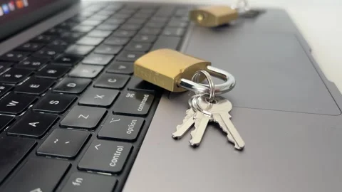Brass Padlock And Keys On Laptop Keyboard For Cyber Security And Data Protection 스톡 동영상 339064084