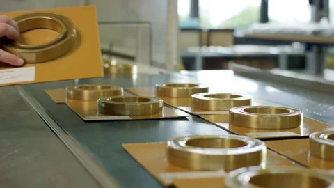 Brass Rings on Production Line with Order Cards, Metal Factory, Close Up Shot Stock-Footage 341491094