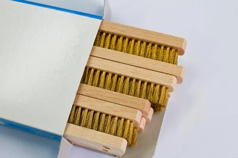 Brass wire brush on white background . Stock Photos