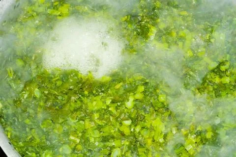 Brassica,vegetable leaves in boiling water, Stock Photos