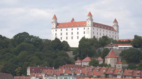 Bratislava Castle on the hill behind the red rooftops of Old Town in Slovakia Stock Footage 285106782