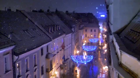 Bratislava street while snowing at night. Shot from Michael's Gate tower. Stock Footage 101549288