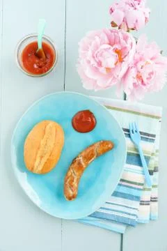 Bratwurst with bread roll Stock Photos