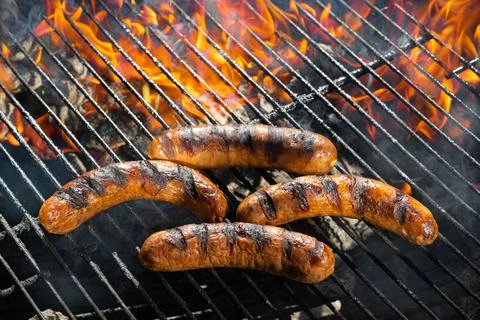 Bratwurst On The Flame Foto stock