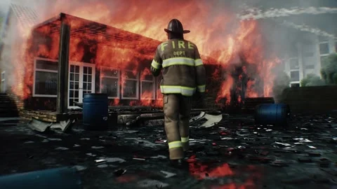Brave Firefighter Approaching Burning House Surrounded by Flames. 스톡 동영상 336515986