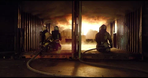 Brave Firefighters Putting Out Fire In The Room Stock Footage 143555506