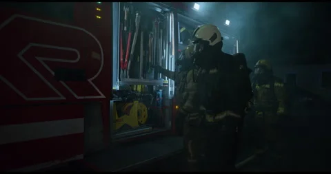 Brave Fireman Preparing Tools For Job Stock Footage 143549073