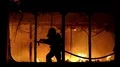 Brave firemen inside burning building HD Footage