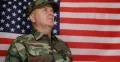 Brave Military Soldier Standing Right Honor Salute Position Windy American Flag 4k or 4k+ Resolution