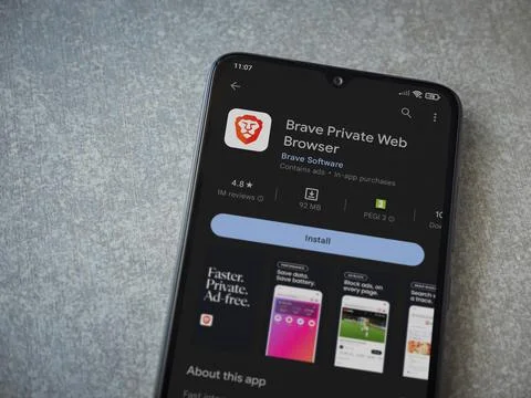 Brave Private Browser app play store page on smartphone on ceramic stone ba.. Stock Photos