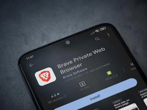 Brave Private Browser app play store page on smartphone on a dark marble st.. Stock Photos