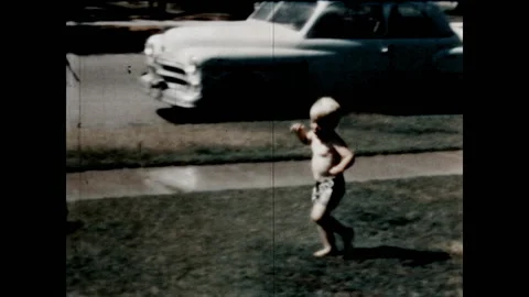 Braving the Sprinkler 1967 Stock Footage 211882826