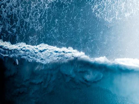 Braving the Surf Symphony Stock Photos