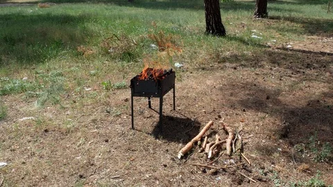 Brazier barbecue grill in forest 4k Stock Footage 89704298