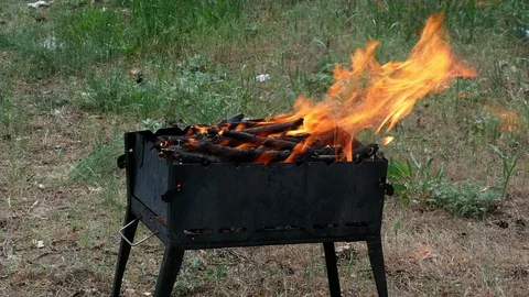 Brazier barbecue grill in forest 4k Stock Footage 89705076