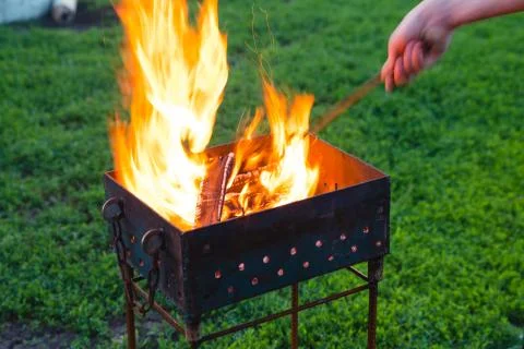 Brazier fire hand Stock Photos