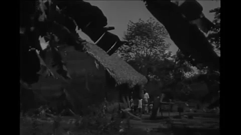 BRAZIL - 1931 - View of a housing development on hillside. A low flying airplane Stock Footage 341988590